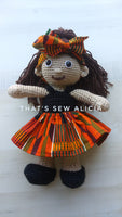 Crochet doll with African print skirt