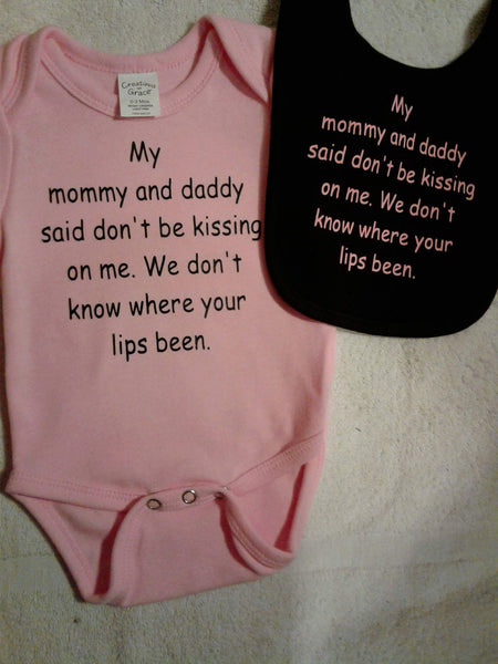 Pink "My mommy & daddy said don't be kissing on me." bodysuit