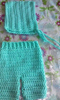Newborn girl's bonnet and shorts set, light turquoise